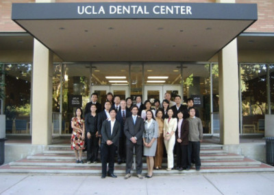 Asian dentists graduating at UCLA with Dr. Jovanovic